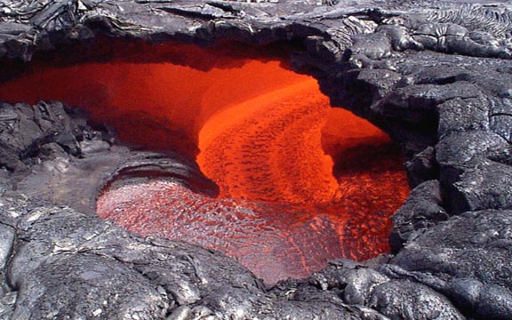 Lava tube from Pu'u O'o eruption. Jim Kauahikaua photo copy.jpg (72095 bytes)